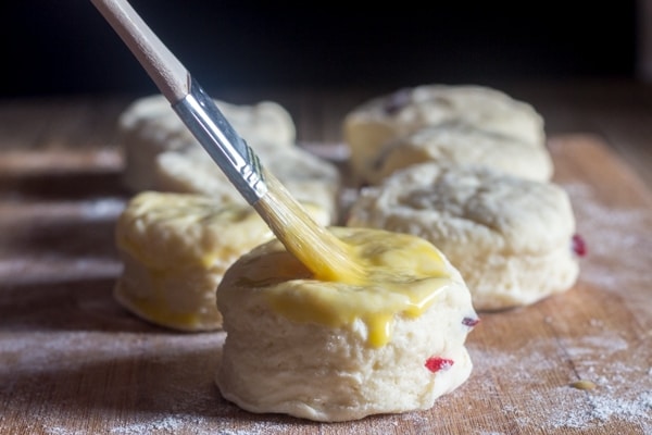 brushing with egg on cranberry scone