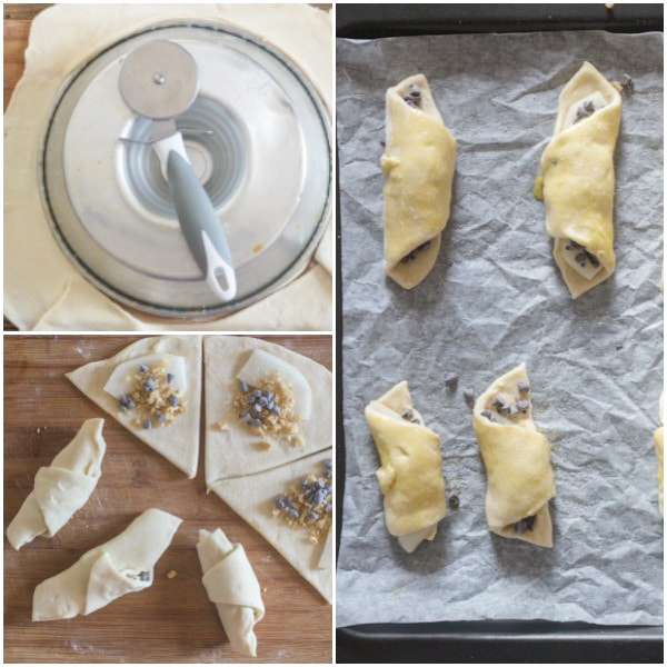 Dough rolled & cut, stuffed to form crescents, ready for baking on a cookie sheet.