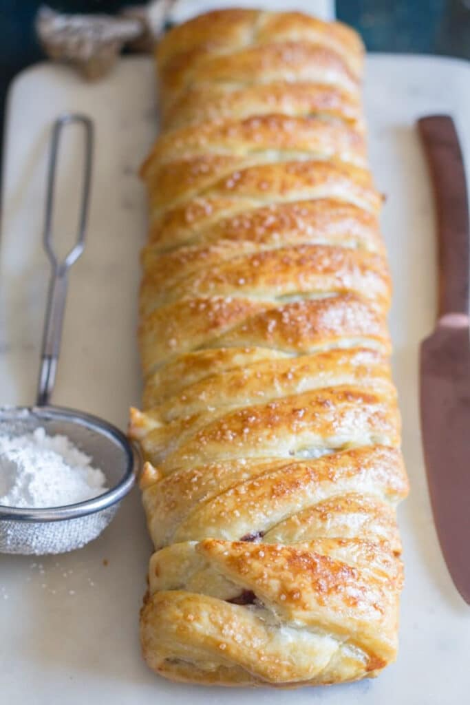 The baked braid on a white board.
