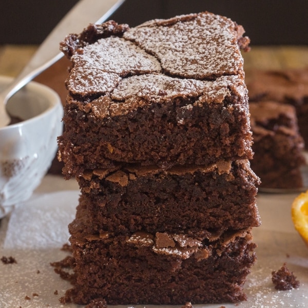 Three bars of brownies stacked.