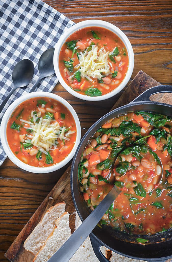 Soup in the pot and in two bowls.