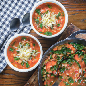 Soup in the pot and in two bowls.