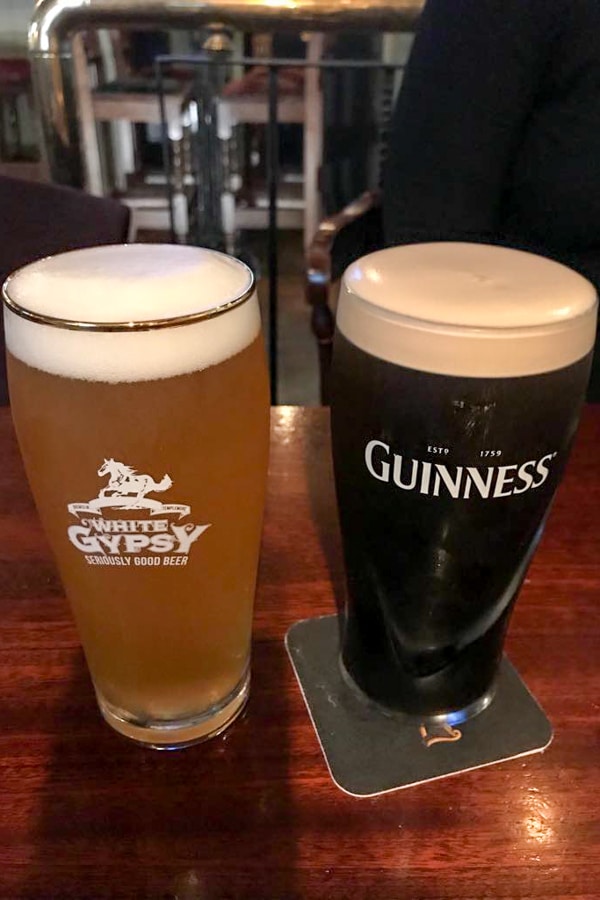 irish beer draft and guinness on a table