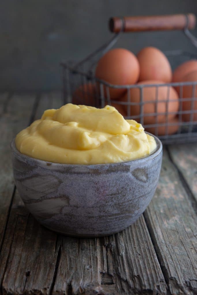 Pastry cream in a grey bowl.