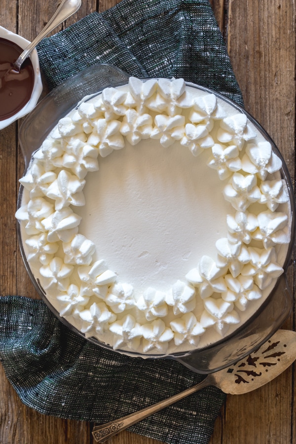 baileys mousse pie on a wooden board