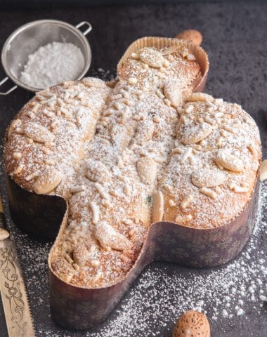 colomba baked with a slice cut on a black board