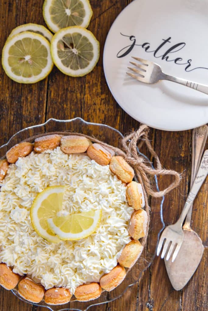 Lemon charlotte on a glass plate.