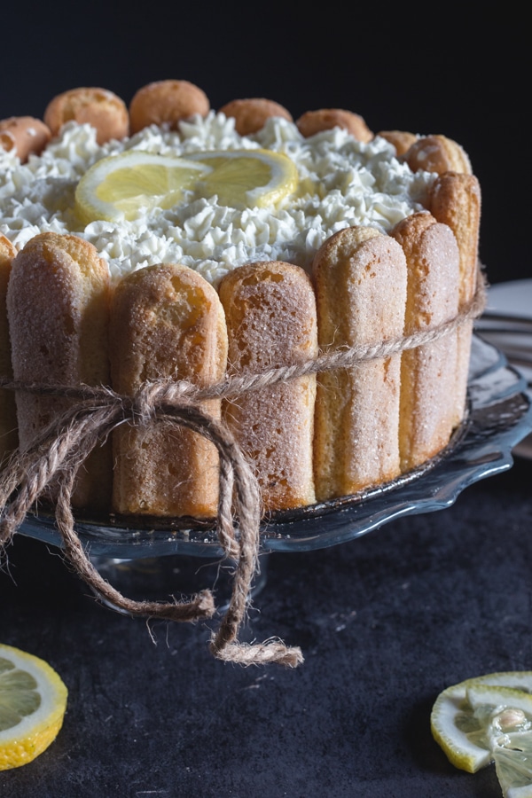 lemon charlotte on a glass cake dish