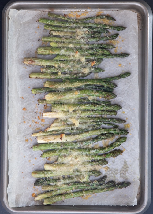 The asparagus baked on the baking sheet.