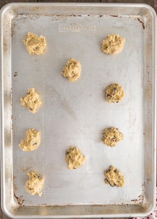 The unbaked cookies on the baking sheet.