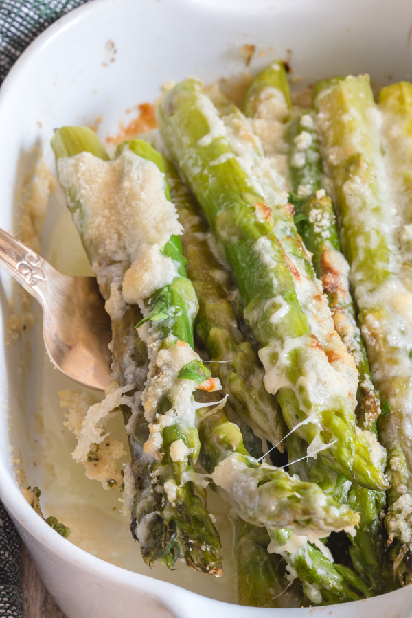 roasted asparagus in a white dish