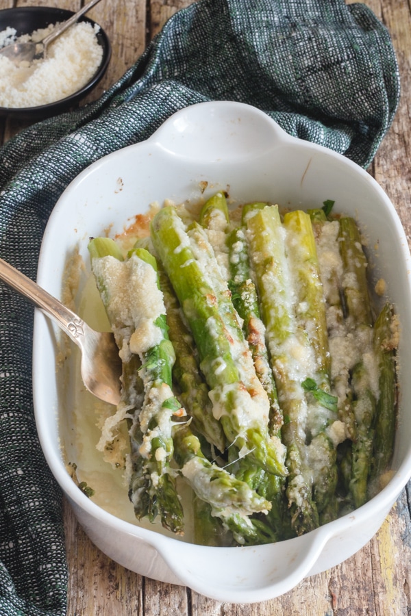 baked asparagus in a white dish