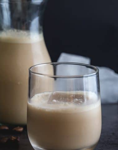 a bottle and a glass of coffee cream liqueur
