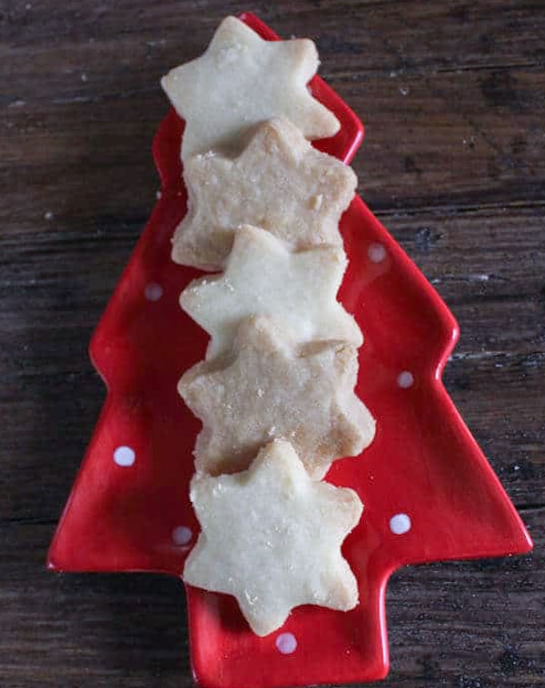 simple and brown sugar shortbread cookies on a red Christmas tree plate