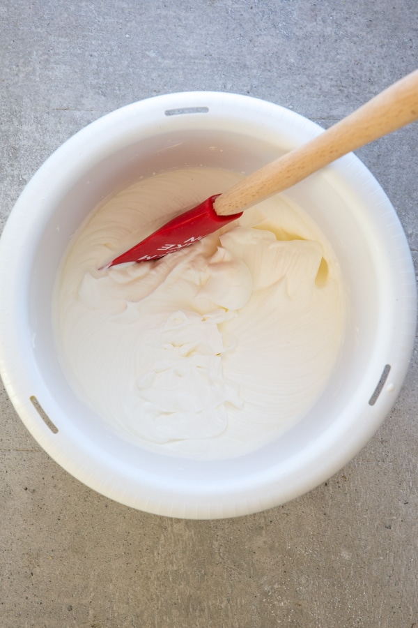 stabilized whipped cream in a white bowl