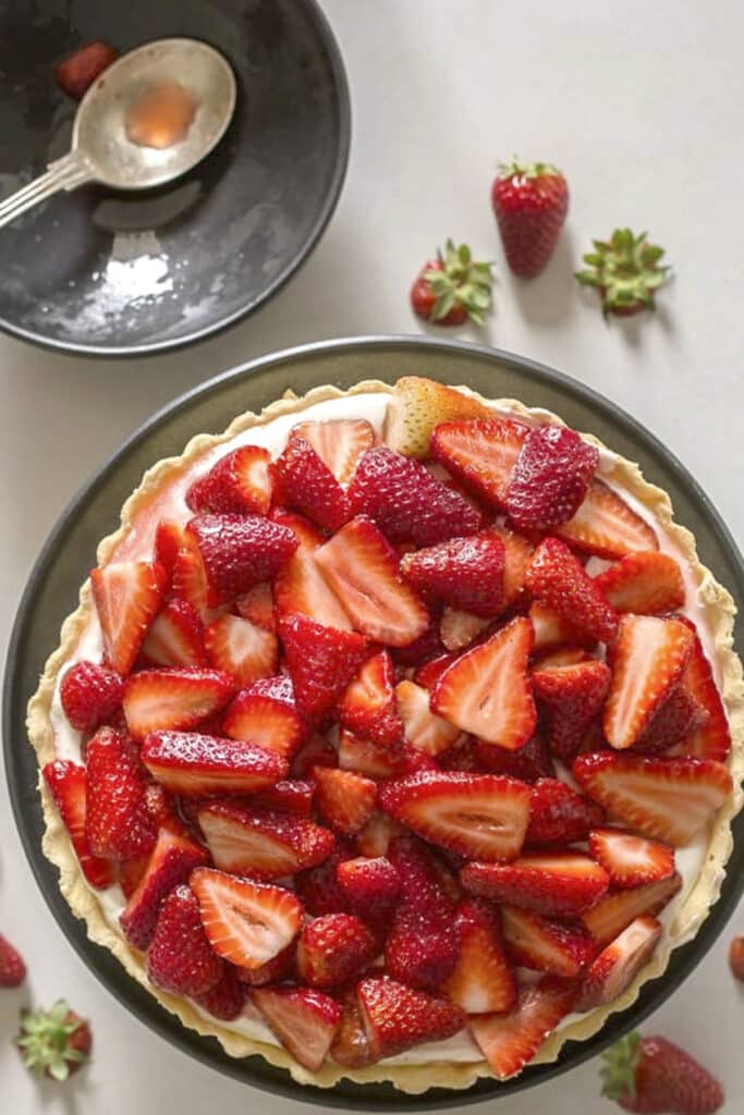 Strawberries covering the whole pie.