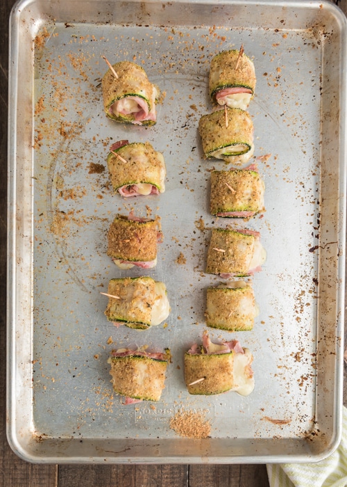 The baked zucchini bites on the baking sheet.
