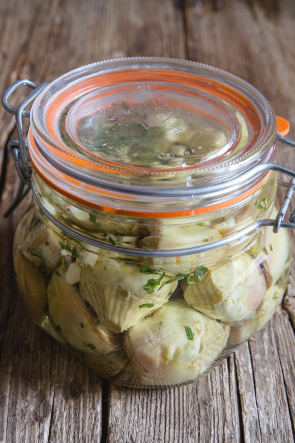 artichokes in a jar covered with oil