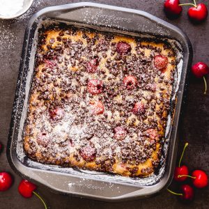 baked cherry blondies in a square pan