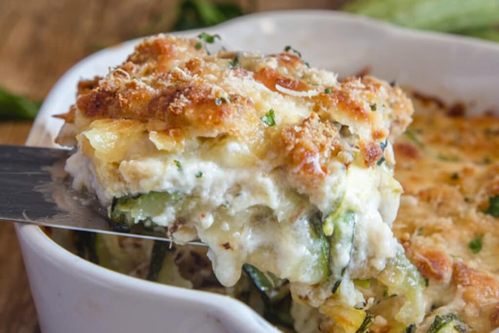 A piece of zucchini bake on a spatula.