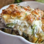 A piece of zucchini bake on a spatula.