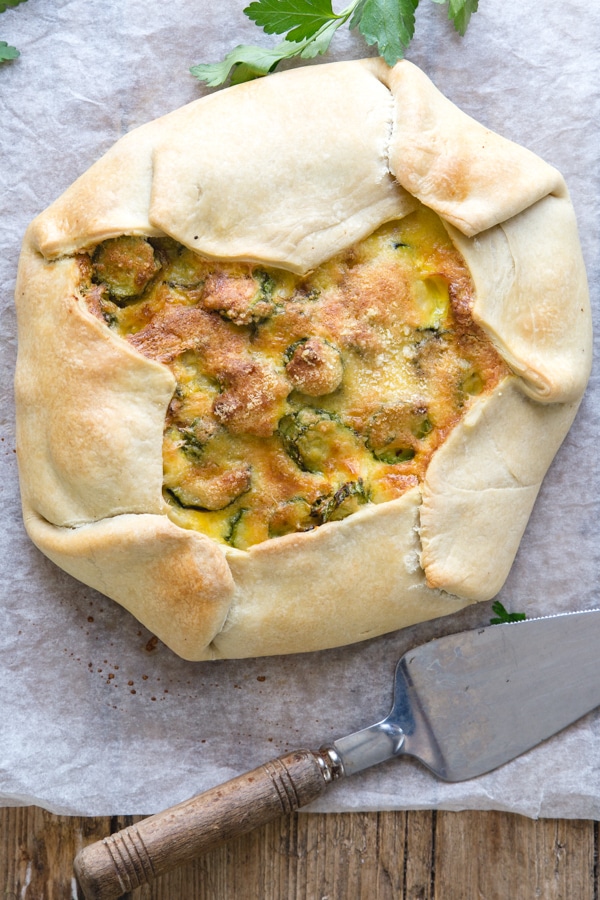 zucchini pie, just baked on parchment paper