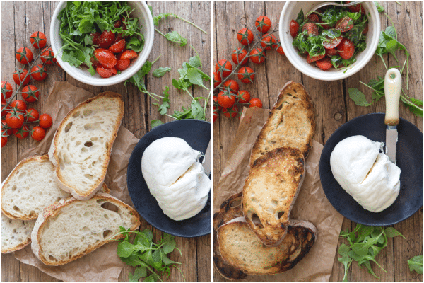 burrata bruschetta ungrilled bread and tomato mixture with burrata on a black plate and grilled bread