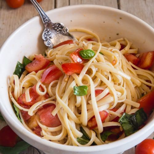 pasta alla checca in a white bowl