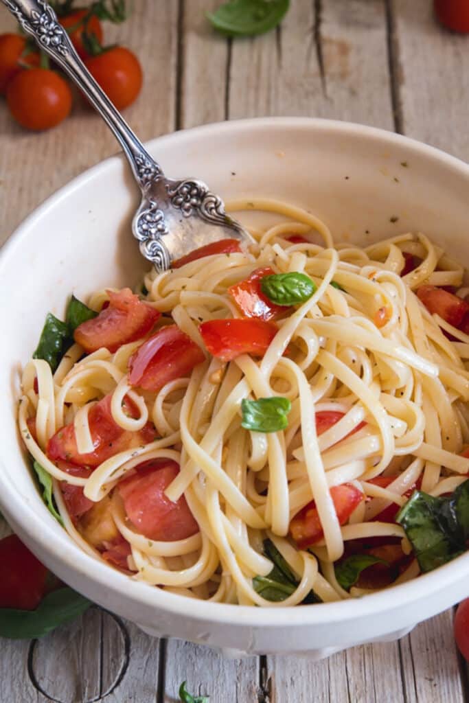 Pasta alla checca in a white bowl.