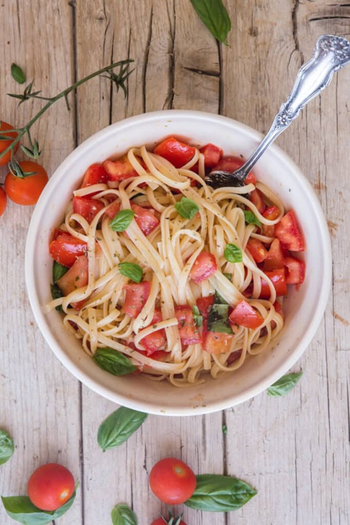 Pasta alla checca in a white bowl.