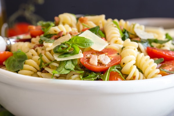 up close pasta salad in a white bowl