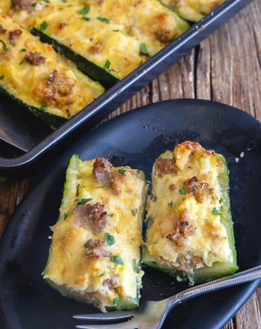 stuffed zucchini on a plate and in the pan