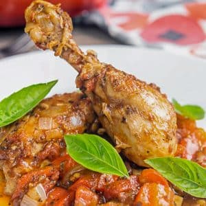 Chicken in a dish with sauce.