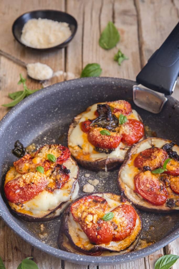 Eggplant stacks in a frying pan.