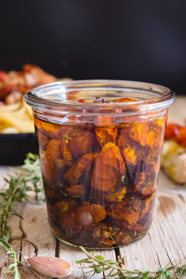 roasted tomatoes in oil in a jar
