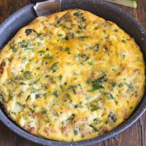 Frittata in a black pan.