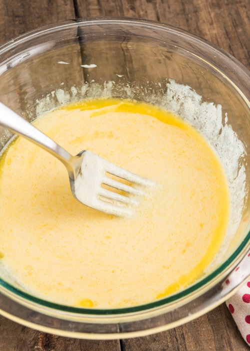 The wet ingredients mixed in a glass bowl.