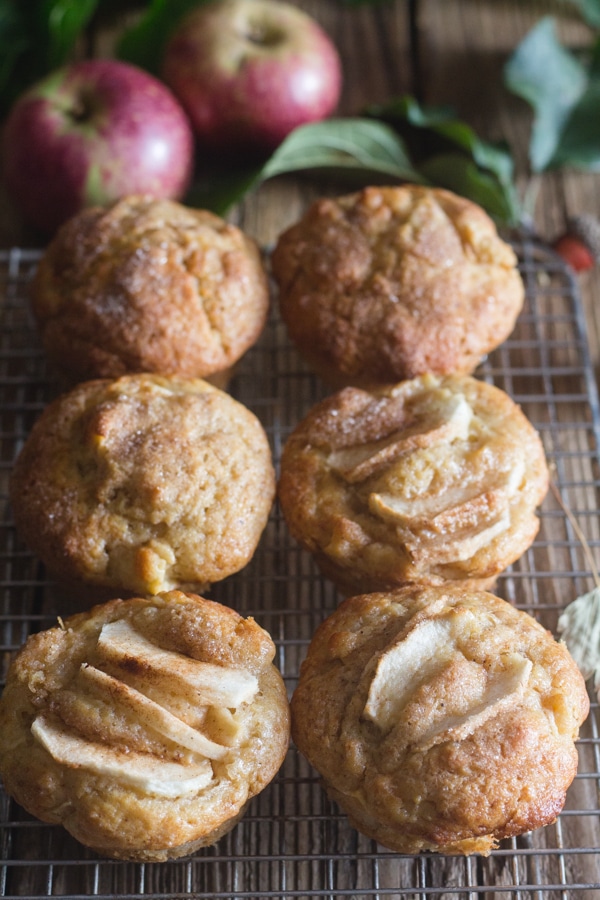 6 apple muffins on a wire rack