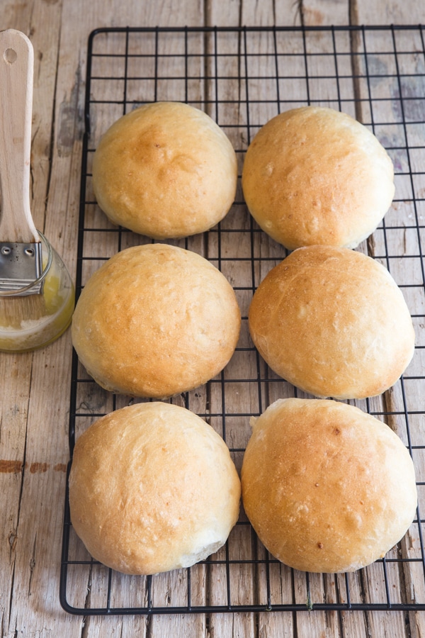 baked dinner rolls on a wire rack