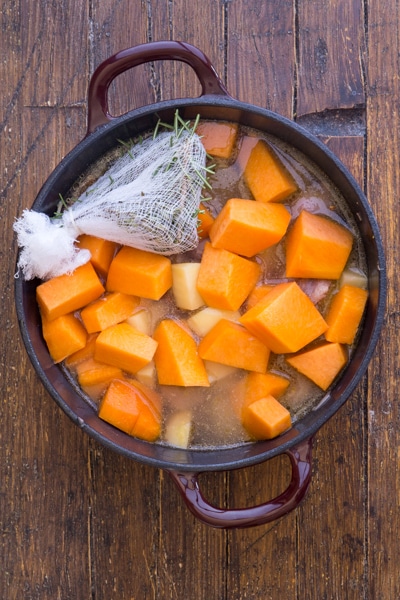 ingredients for pumpkin stew in the pot to cook