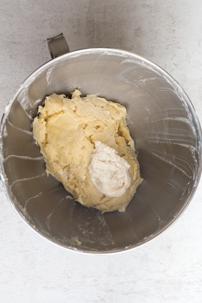 adding the biga to the dough 