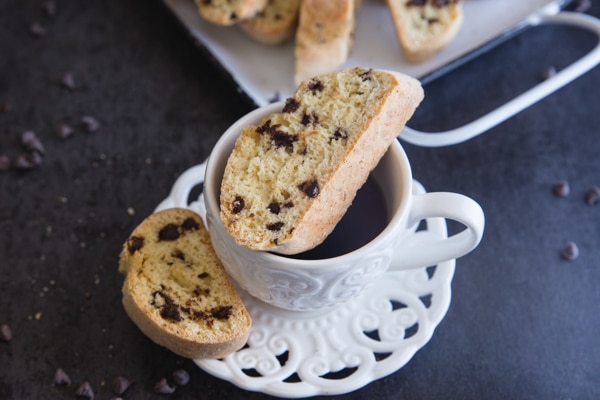 a biscotti cookie on a coffee cup