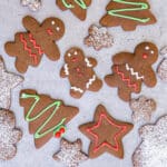 Gingerbread cookies on a white board.