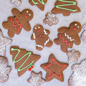 Gingerbread cookies on a white board.
