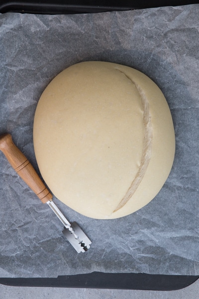 scoring the dough before baking