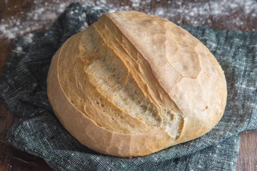 Bread on a blue napkin.