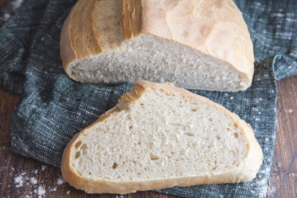 Bread with a slice cut.