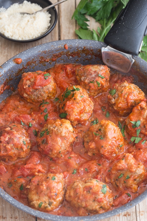 cooked meatballs in a frying pan
