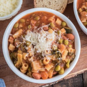 Minestrone in a white bowl.