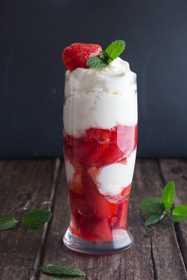 mascarpone cream layered with strawberries in a glass